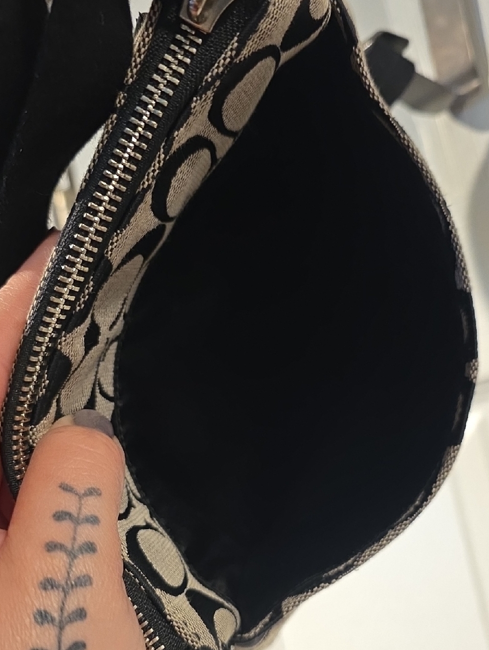 Coach Poppy Signature Small Crossbody Bag featuring the brand's iconic "C" - Picture 5 of 11